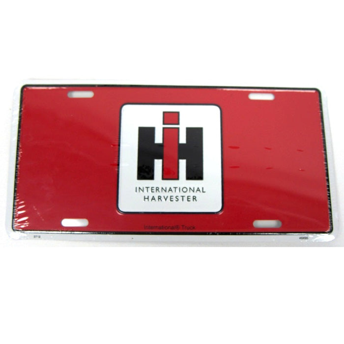Red License Plate with large IH Logo in center