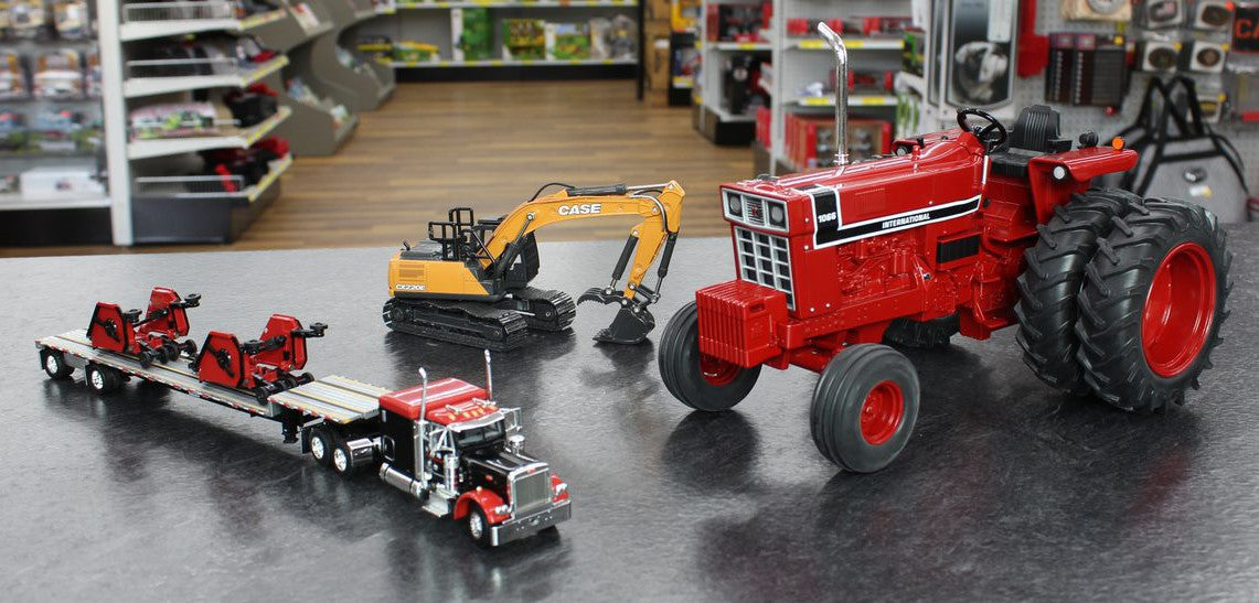 Spread photo of red International Harvester tractor, yellow Case excavator, and red and black semi truck with two mowers on the trailer.