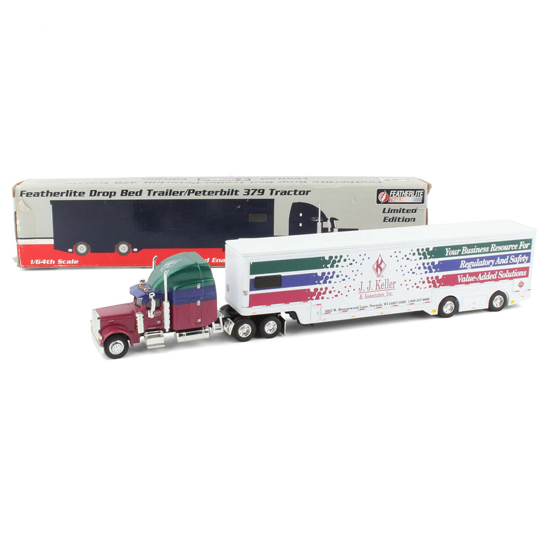 1/64 JJ Keller & Associates Inc Peterbilt 379 Semi with Featherlite Drop Bed Trailer by SpecCast