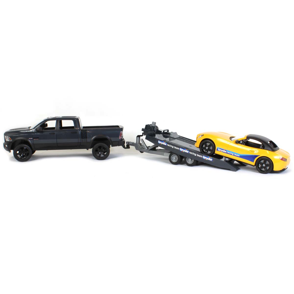 1/16 RAM 2500 Pickup with Yellow Racing Team Roadster by Bruder