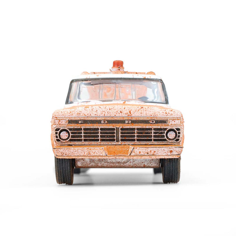 1/64 1973 Ford F-100 with Drop-In Tow Hook, Weathered White, Blue Collar Collection Series 14