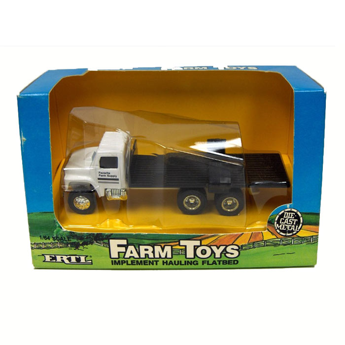 1/64 Tandem Axle Implement Hauling Flatbed by ERTL