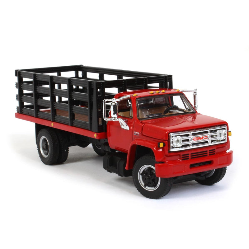 1/64 GMC 6500 Stake Bed, Red with Black Stakes, DCP by First Gear