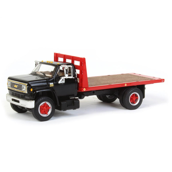 1/64 Black Chevy C65 Single Axle Truck with Red Flatbed, DCP by First Gear