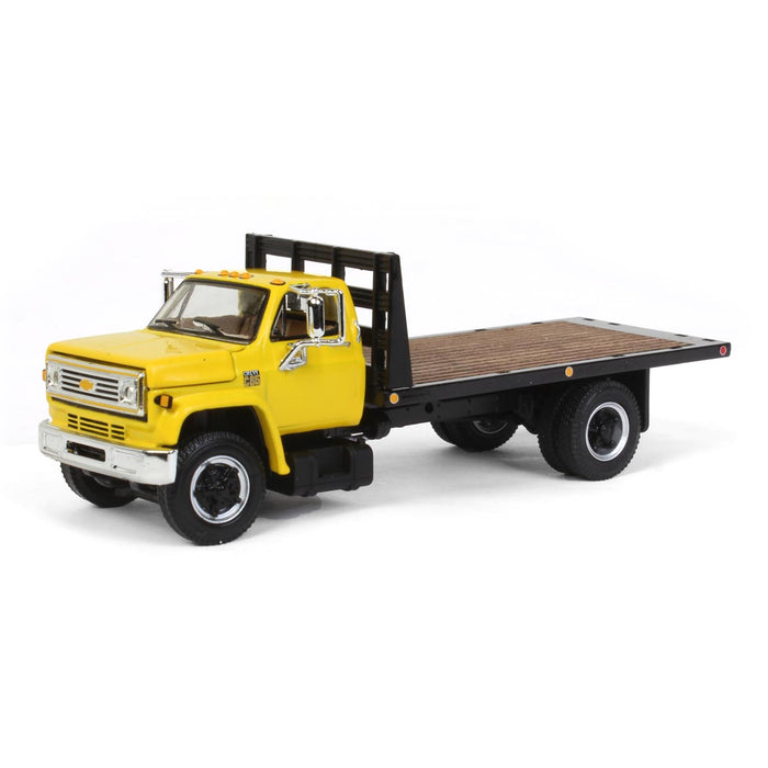 1/64 Yellow Chevy C65 Single Axle Truck with Black Flatbed, DCP by First Gear