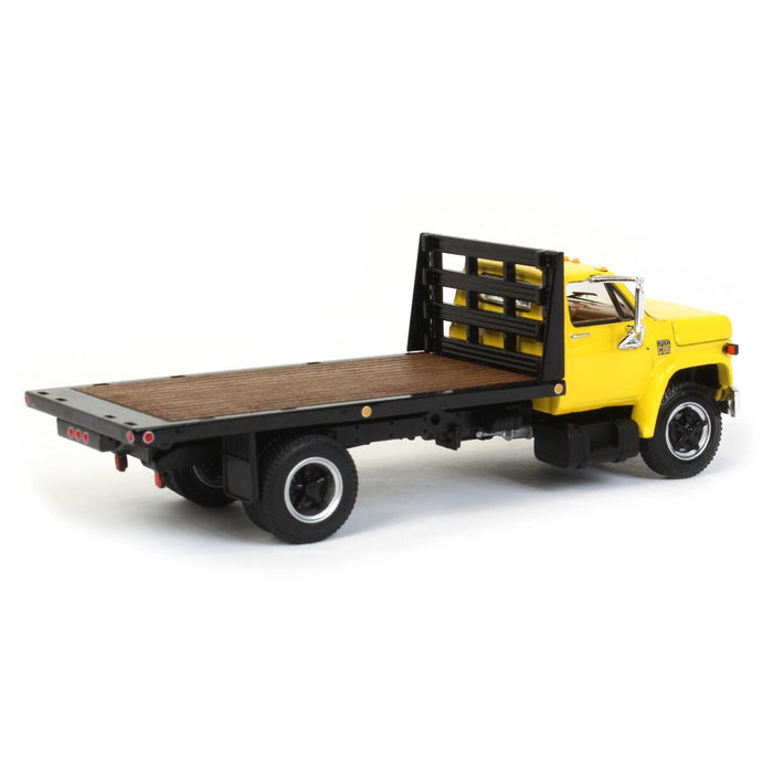 1/64 Yellow Chevy C65 Single Axle Truck with Black Flatbed, DCP by First Gear