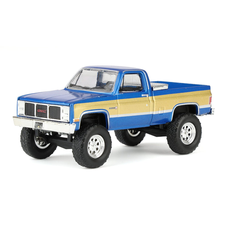1/64 Lifted 1987 GMC K2500 Pickup Truck with Toolbox & Gooseneck Flatbed Trailer, Blue & Gold