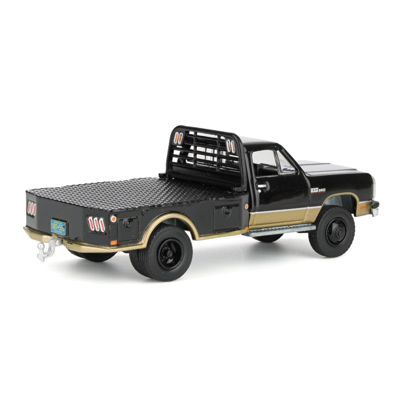 1/64 1992 Black & Gold 1st Gen Dodge Ram Dually Flatbed Truck with Gold Gooseneck Flatbed Trailer, OBT Exclusive