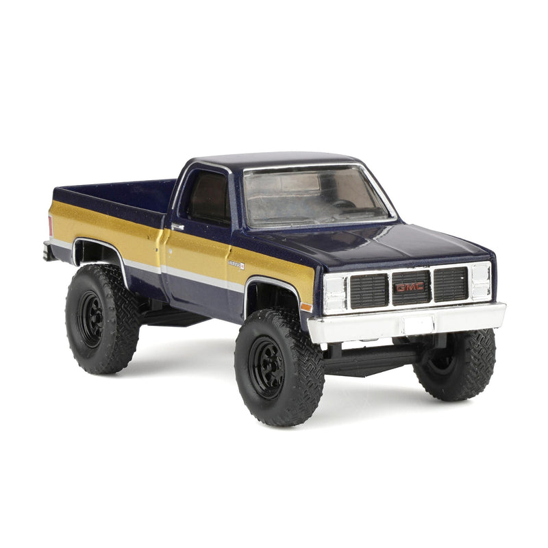 1/64 Lifted 1987 GMC K2500 High Sierra Pickup Truck, Stone Blue Metallic & Gold Dealer Exclusive by GreenLight Collectibles