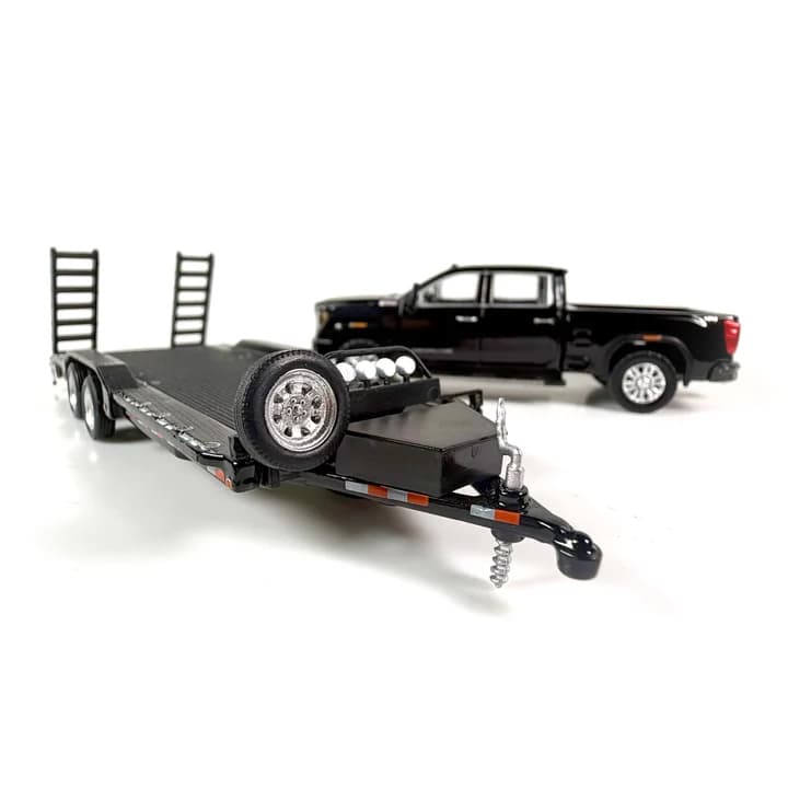 1/64 2022 GMC Denali 2500HD Pickup Truck with Flatbed Trailer in Black by GreenLight Collectibles, Dealer Exclusive