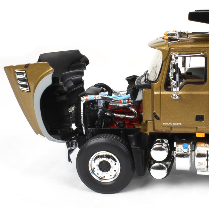 1/34 Gold & Black Mack Granite MP Engine Series Dump Truck by First Gear
