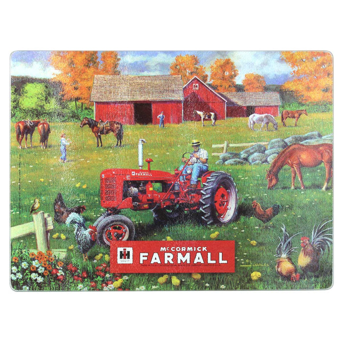 IH McCormick Farmall C Tractor in Farm Scene Glass Cutting Board, 15.5in x 11.75in