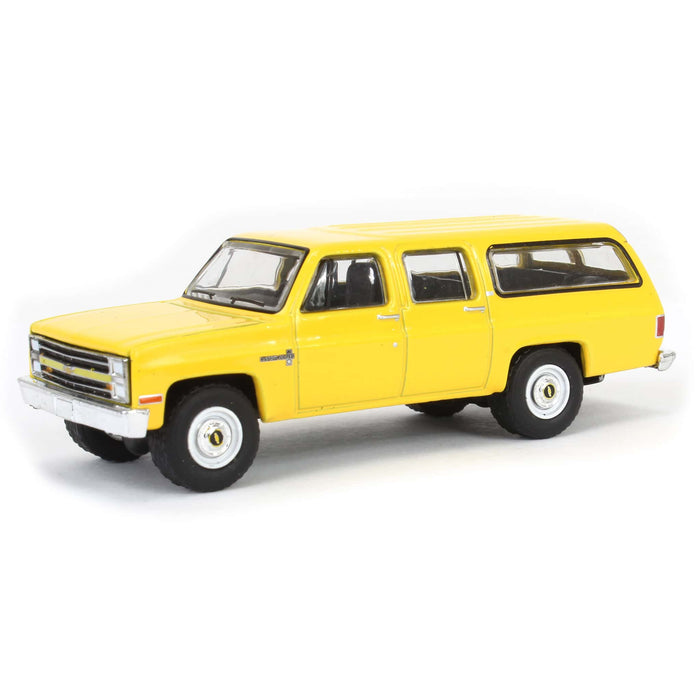 1/64 1987 Chevrolet Suburban K20 Custom Deluxe, Construction Yellow, Blue Collar Series 13