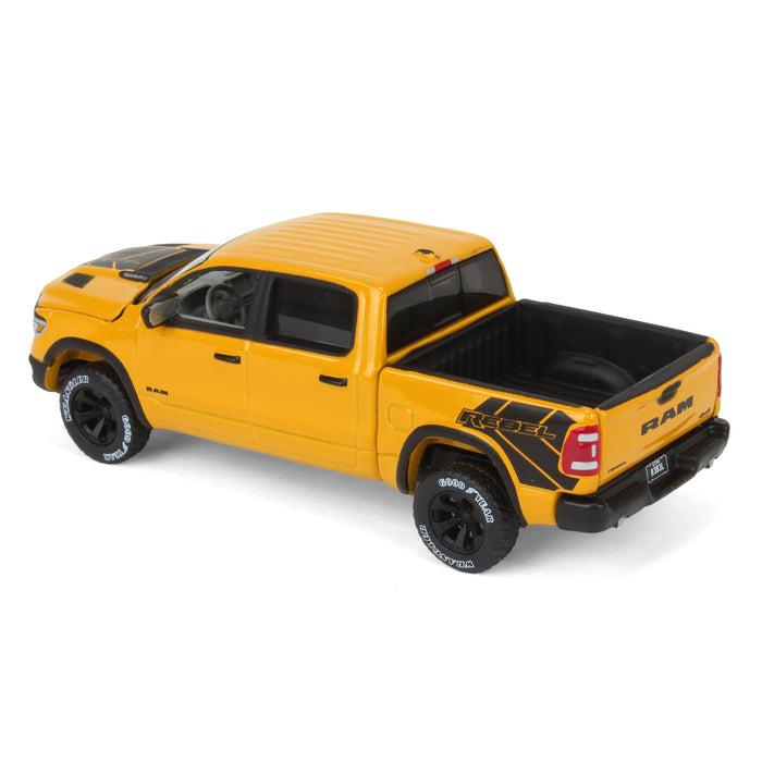 1/64 2023 Dodge Ram Rebel Havoc Edition, Baja Yellow, Auto World Image