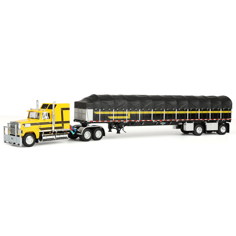 1/64 Ford LTL 9000 Semi Truck with 53ft Wilson Roadbrute Flatbed Trailer & Covered Wagon, Yellow/Black, DCP by First Gear