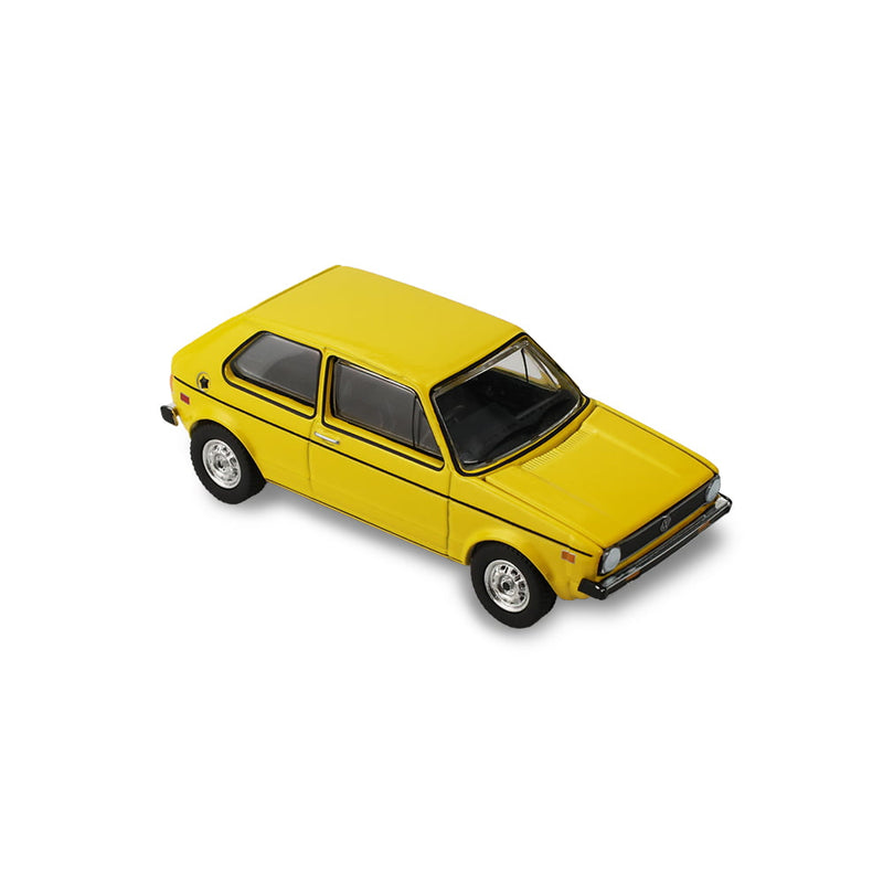 1/64 1977 Volkswagen Rabbit Riyad Yellow with Female Customer, The Hobby Shop Series 17 by Greenlight Collectibles