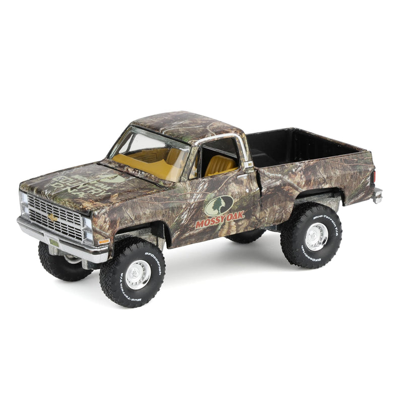1/64 1983 Chevy Silverado Lifted Pickup Truck with Mossy Oak Accent by Big Country & Auto World