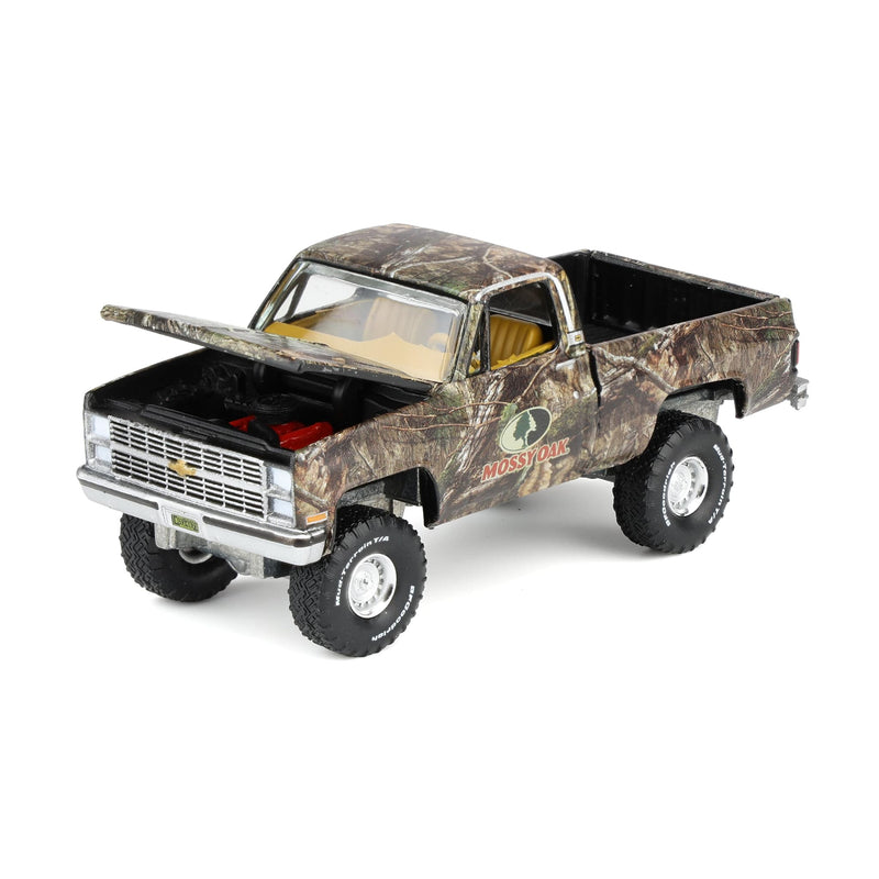 1/64 1983 Chevy Silverado Lifted Pickup Truck with Mossy Oak Accent by Big Country & Auto World