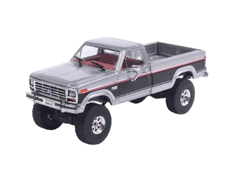 1/64 1985 Ford F-250 XLT Lariat 4x4 Long Bed Pickup Truck, Two-Tone Silver Metallic & Raven Black by IXO America