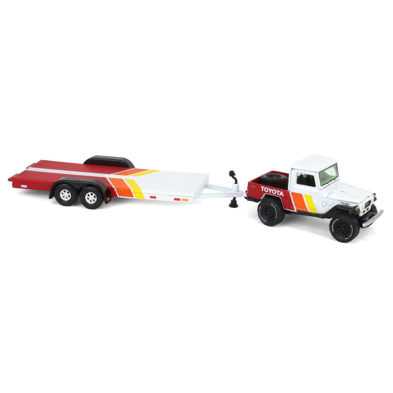 1/64 1980 Toyota Land Cruiser with Open Car Trailer in White with Custom Toyota Deco, Johnny Lightning