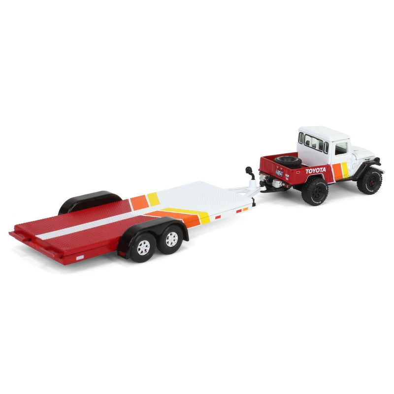 1/64 1980 Toyota Land Cruiser with Open Car Trailer in White with Custom Toyota Deco, Johnny Lightning