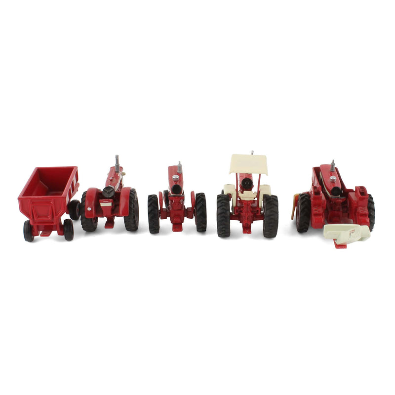 Lot of (3) Farmall Tractors, (1) 1/64 International Tractor, (1) 1/64 Mounted Picker, and (1) Barge Wagon by ERTL
