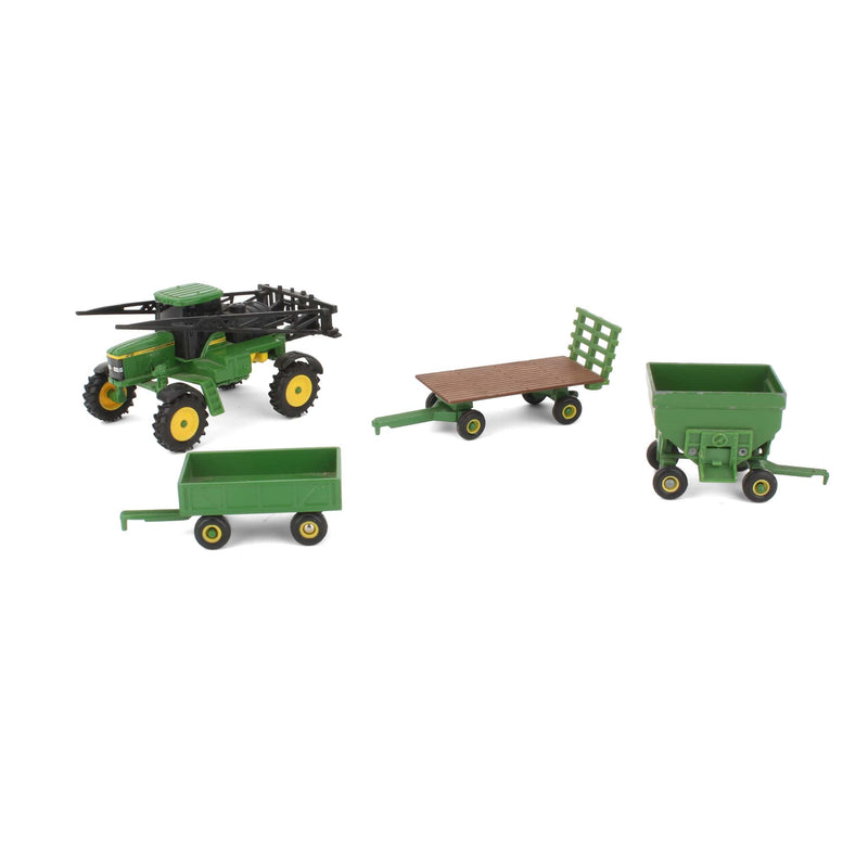 Lot of (3) 1/64 Green Farm Wagons and (1) 1/64 John Deere Self-propelled Sprayer