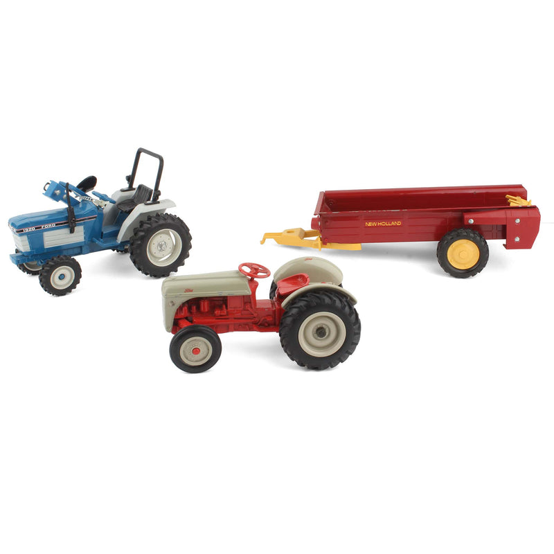 Lot of (2) 1/16 Ford Tractors, (1) 1/16 New Holland Manure Spreader, and (1) 1/16 Ford 2-Row Plow