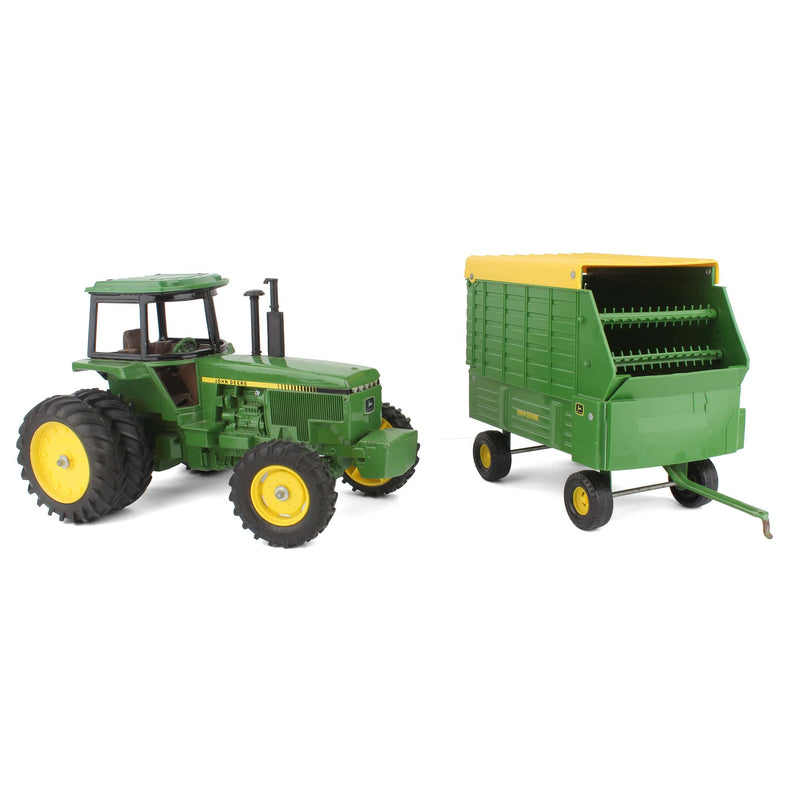 Lot of (1) 1/16 John Deere 4850 Tractor and (1) 1/16 John Deere Forage Wagon by ERTL