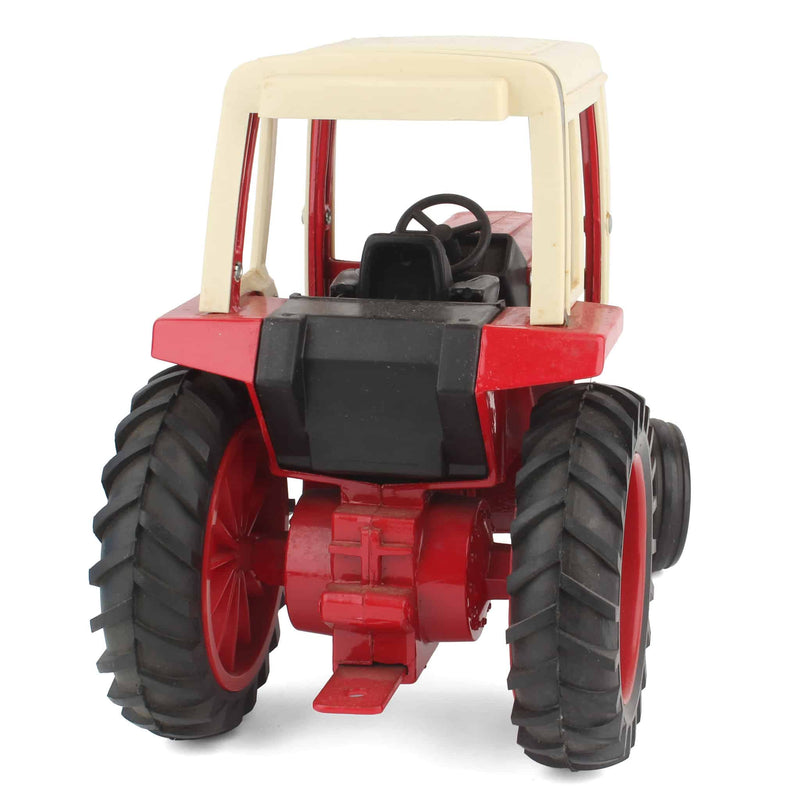 Lot of (1) 1/16 Case International 1086 Tractor with Cab and (1) 1/16 Red Forage Wagon by ERTL