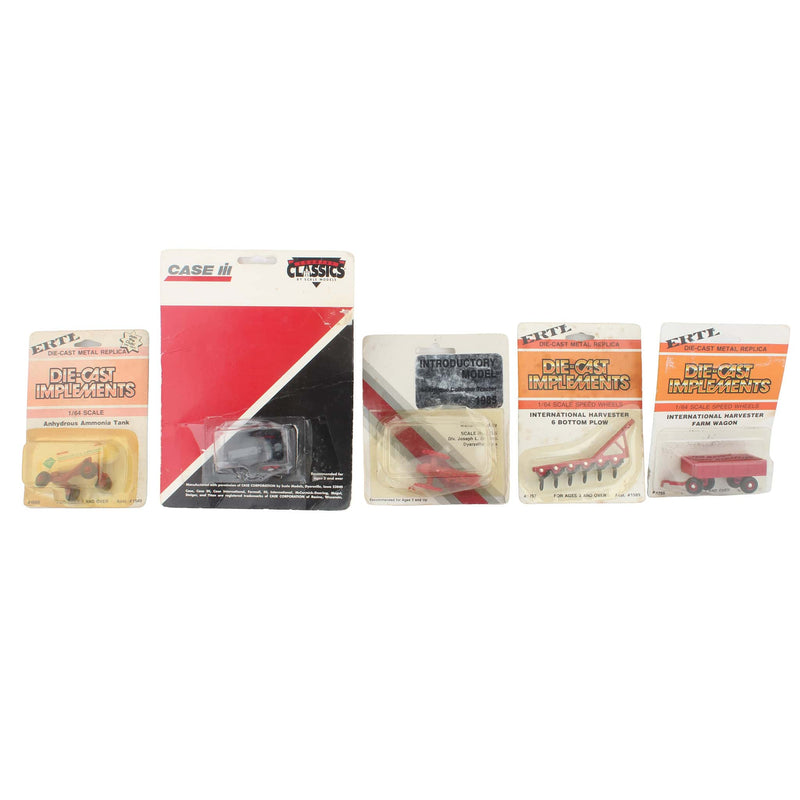 Lot of (1) 1/64 Diecast Tractor, (1) 1/64 Plastic Tractor, and (3) 1/64 Farming Implements