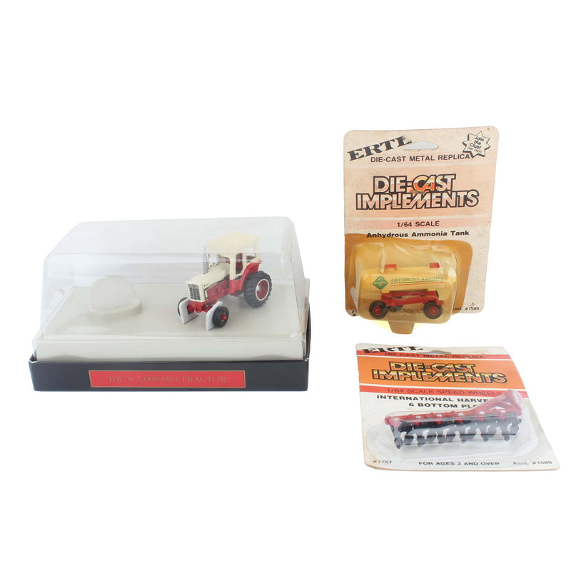 Lot of (1) 1/64 International Harvester 1066 Tractor, (1) 1/64 IH Plow, and (1) 1/64 Anhydrous Ammonia Tank by ERTL