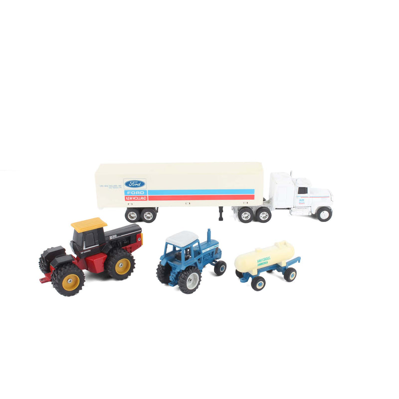Lot of (1) 1/64 Semi with Trailer, (2) 1/64 Tractors, and (1) 1/64 Farm Implement