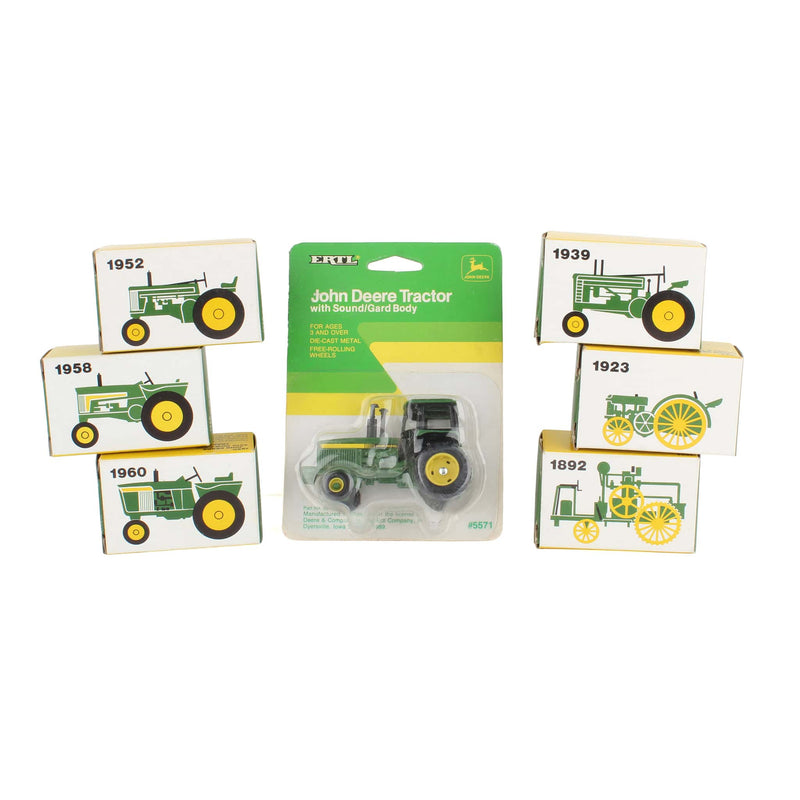 Lot of (7) 1/64 John Deere Tractors of Various Years