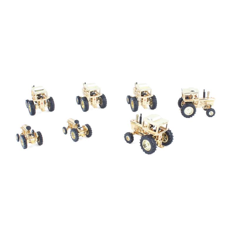 Lot of (7) 1/64 Gold Tractors