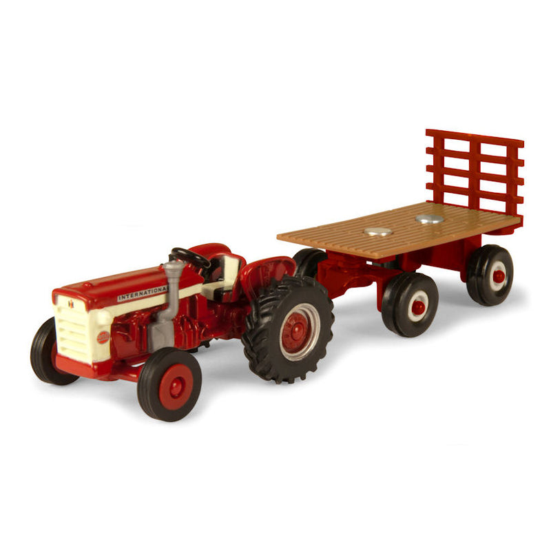 1/64 International Harvester 460 Utility Tractor with Hay Wagon 2 Piece Set by ERTL