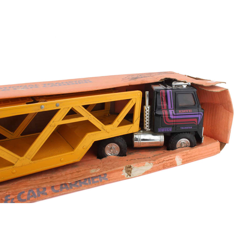 (B&D) International Transtar Truck and Car Carrier, Approximate 1/20 Scale by ERTL - Damaged Item, Damaged Box
