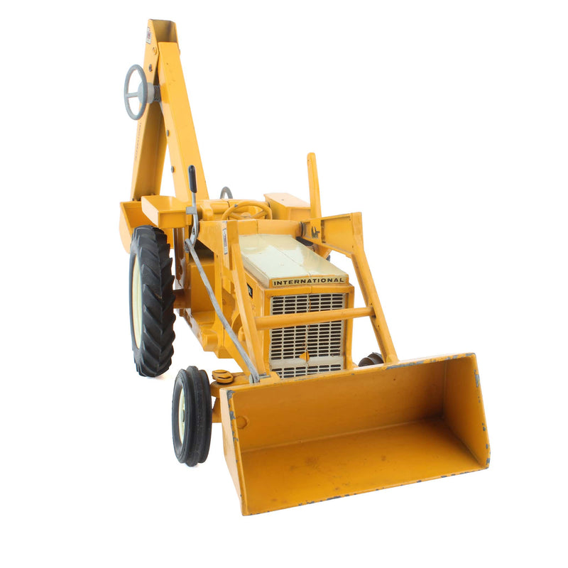 (B&D) 1/16 International 3444 Tractor with Loader and Backhoe by ERTL - Damaged Item, LOOSE
