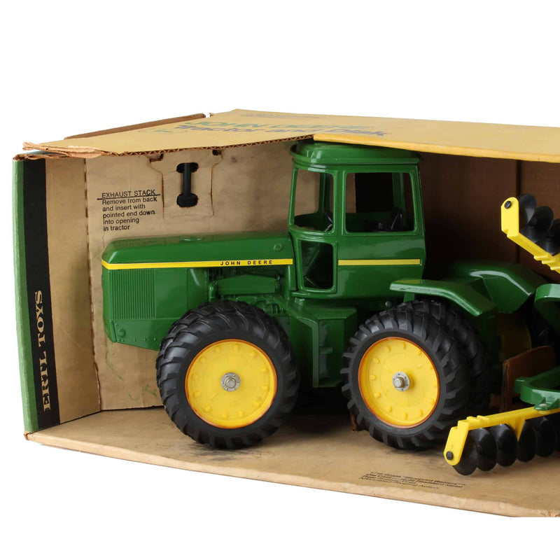 1/16 John Deere 8630 4WD Tractor with Duals and Wing Disk by ERTL