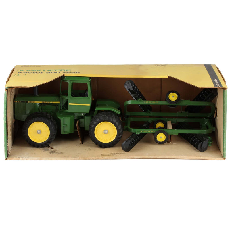 1/16 John Deere 8640 4WD Tractor with Duals and Wing Disk by ERTL