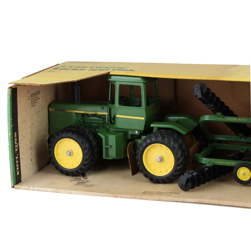 1/16 John Deere 8640 4WD Tractor with Duals and Wing Disk by ERTL